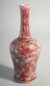 A CHINESE RED AND GREEN SPECKLED PORCELAIN VASE. 9ins high.