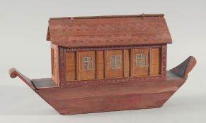 A WOODEN NOAH'S ARK 15ins long.