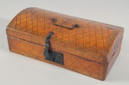 A GEORGIAN LEATHER DOMED TOP CASKET with metal handle and lock. 10ins long.