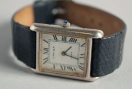 A LADIES CARTIER.925 SILVER WRISTWATCH with leather strap. Retailed by Harrods, London.