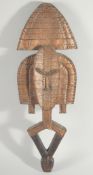 A KOTA FUVERY WOOD AND BRASS TRIBAL FIGURE. 24ins long.
