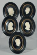 A SET OF FIVE FRAMED SILHOUETTES