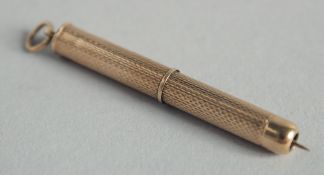 A 9CT GOLD CIGAR PRICKER.
