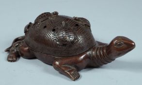 A CHINESE BRONZE TURTLE. 4cm diameter.