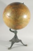 A LARGE AMERICAN GLOBE OF THE WORLD by C. F. WISE, CHICAGO. 18ins diameter on a cast iron base.