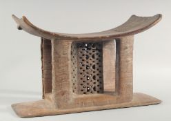 AN ASHANTI STOOL 18ins long.