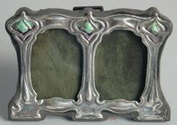 A SMALL SILVER DOUBLE PHOTOGRAPH FRAME. 3ins x 4ins.