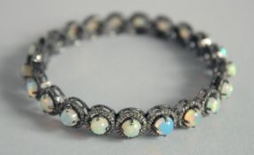 A GOOD OPAL AND DIAMOND BRACELET.