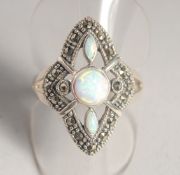 A SILVER MARCASITE AND GILSON OPAL RING.