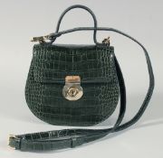 A SAGE AND BROWN GREEN CROCODILE SKIN BAG with a long and a short handle. 7.5ins long, 6ins deep.