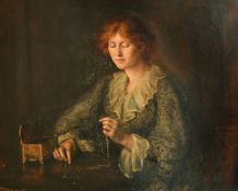 Mona Hopton Bell (1867-1940) British, a young lady examining her jewellery, oil on canvas, signed,