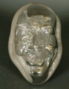 Wayne D Filan (American, born 1946) Two highly unusual silvered opaque glass sculptures of head