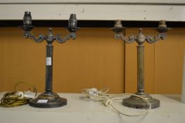 A pair of plated twin branch table lamps.
