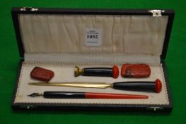 A cased writing set.