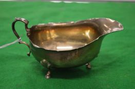 A silver sauceboat.