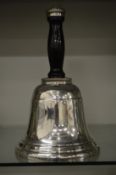 Asprey of London, a hand bell shaped cocktail shaker.