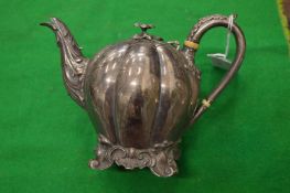 A good small silver melon shaped teapot.