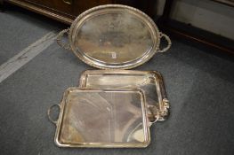 An oval plated tray and two others.