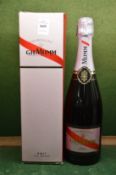 One bottle of Mumm rose champagne, boxed.