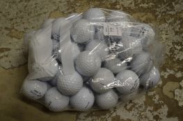 A bag of fifty Top Flite golf balls.