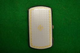 A ladies silver and enamel cigarette case.
