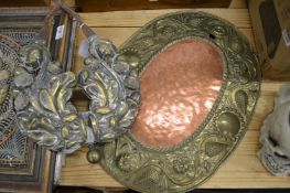 Decorative brass plaques.