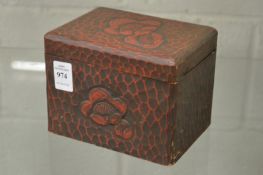 A Chinese lacquer tea caddy.