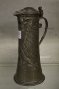 A large Continental pewter lidded ewer or flagon.