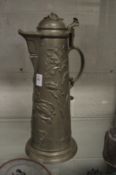 A large Continental pewter lidded ewer or flagon.