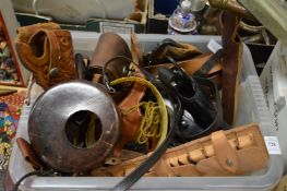 Various knife scabbards, cartridge cases and related items.
