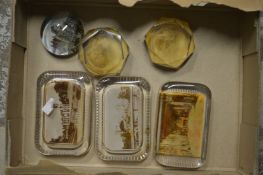 Six glass paperweights.
