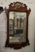 A Georgian style mahogany fretwork framed wall mirror.