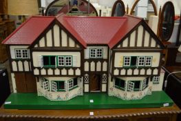 A good large mock Tudor-style dolls house.