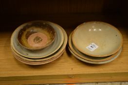 A group of Chinese pottery bowls.