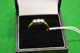 A 9ct gold dress ring.