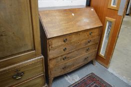 A good George III 'plum pudding' mahogany bureau with fall flap enclosing a fitted interior above