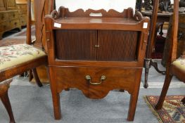 A George III mahogany tray top commode.