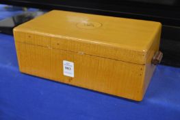 David Joel, Kingston Bypass London, a birch cigarette box with concealed opening mechanism.