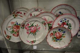 Eight Continental floral decorated plates.