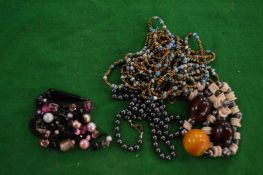Various decorative bead necklaces etc.