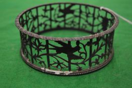 A small silver dish ring with pierced decoration together with a Continental silver dish with