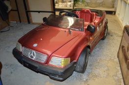 Childs battery operated Mercedes car.