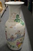A large Chinese vase decorated with figures (rim chips).