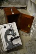 Cased microscope.