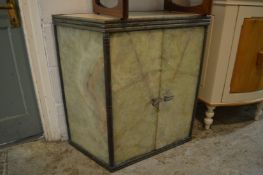An unusual alabaster and metal cupboard.