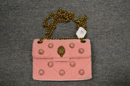 A Kurt Geiger ladies pink handbag.