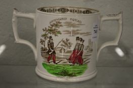 A Staffordshire twin handled loving cup 'Awkward Squad'.