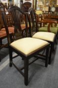 A pair of George III design mahogany dining chairs.