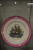 A Grays pottery lustre ware plate depicting a sailing ship.
