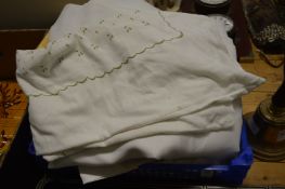 Various linen and textiles.
